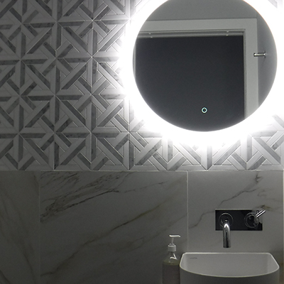 Powder room mirror and and tiles